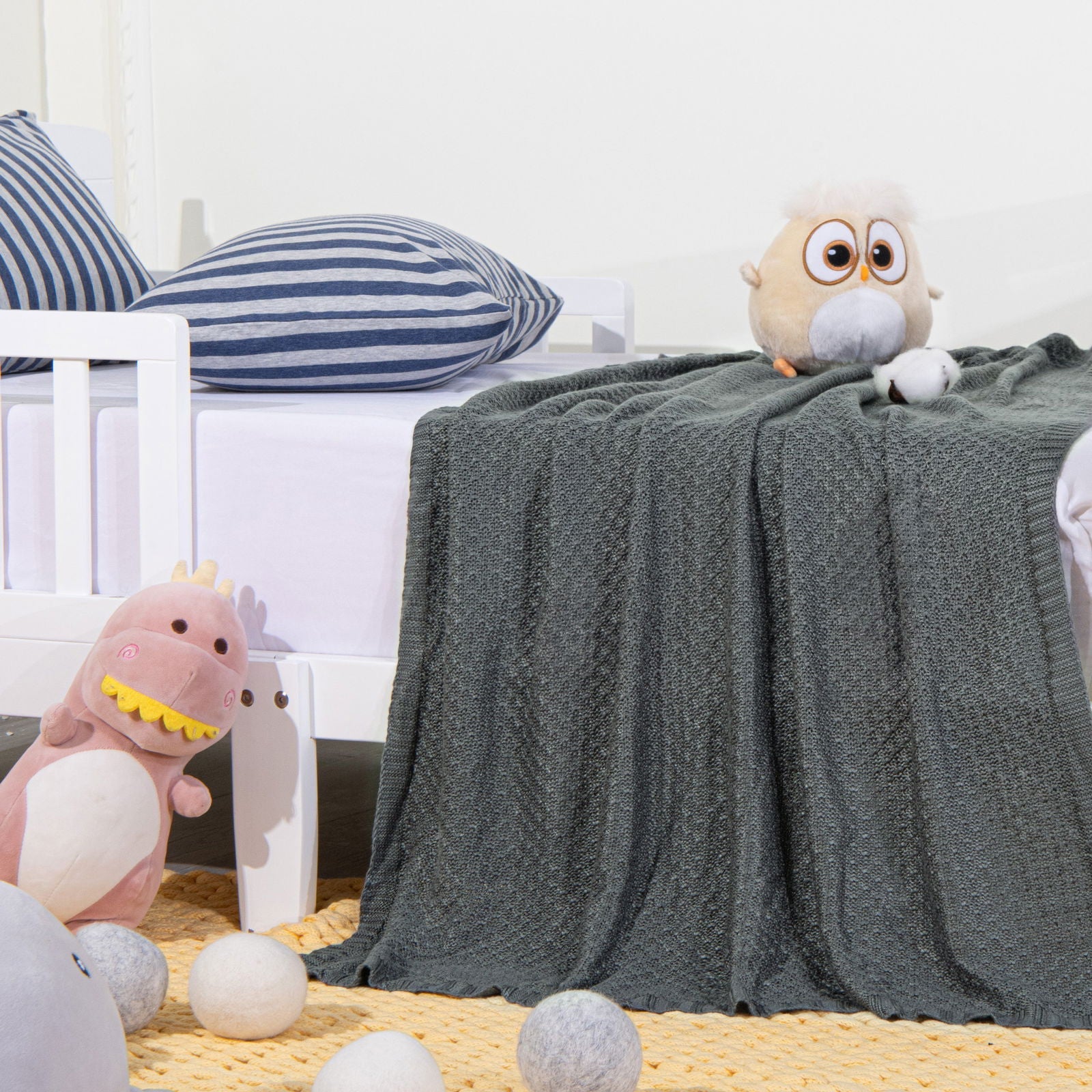 Bamboo Cable Knitted Toddler Blanket detail view by Fasiano